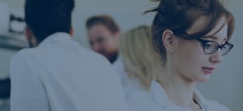 Group of people in lab coats